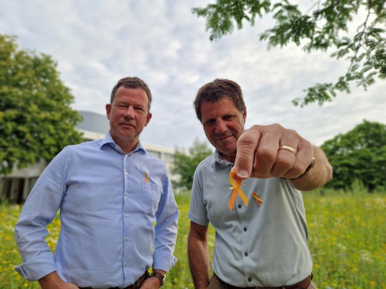 Foto van raad van bestuur met het lintje 